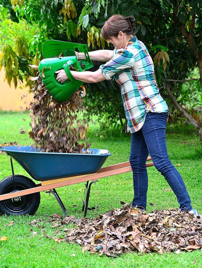 model uses oversized scooping claws to determination leaves