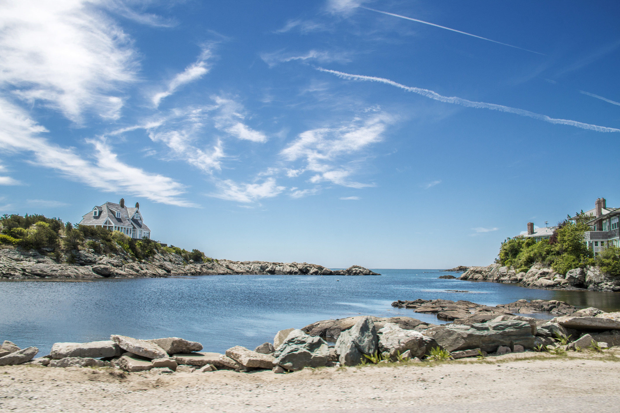 A picture of the blue sky over an ocean inlet in Newport, Rhode Island