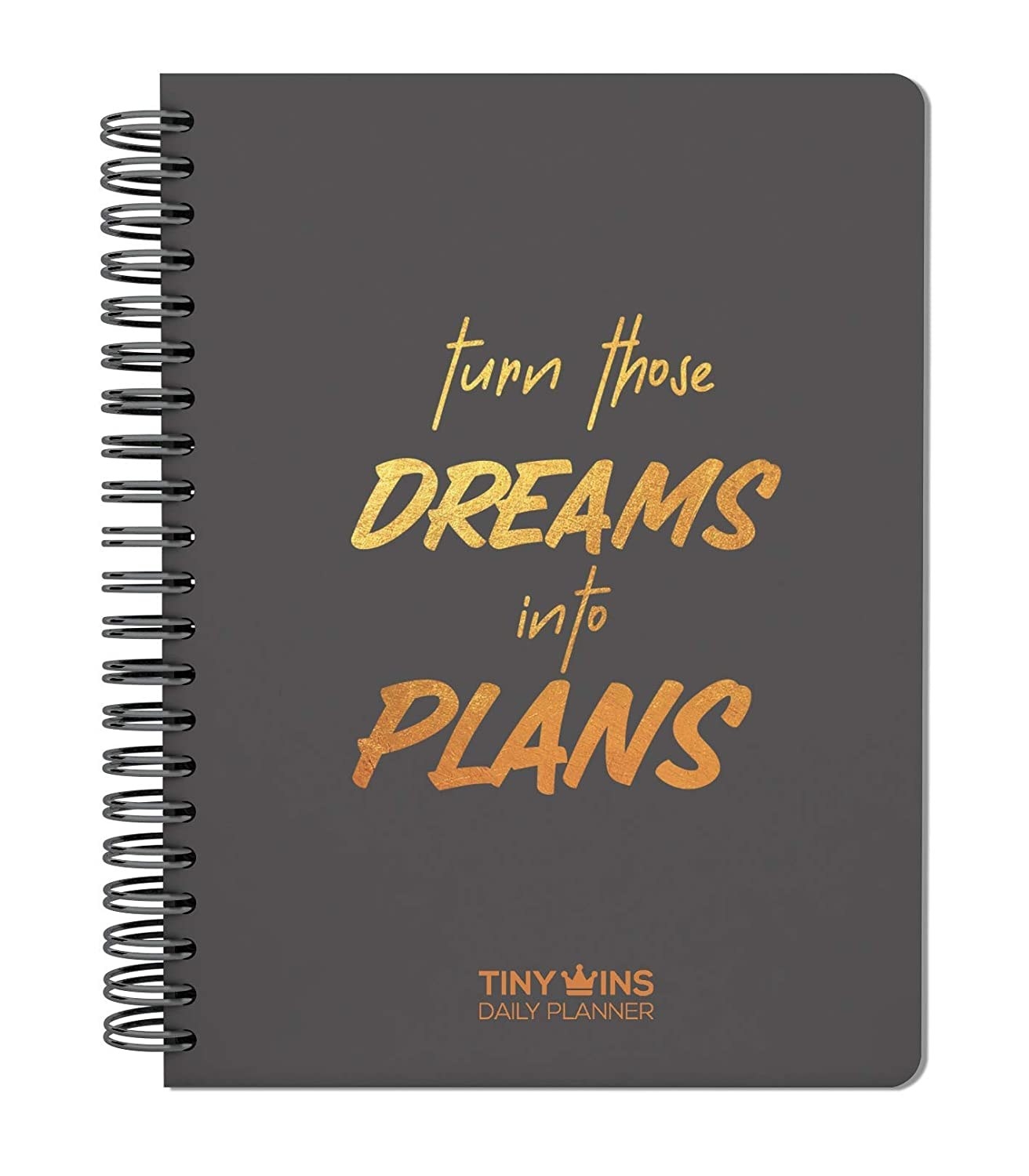 A black daily planner with &quot;turn those dreams into plans&quot; written on it