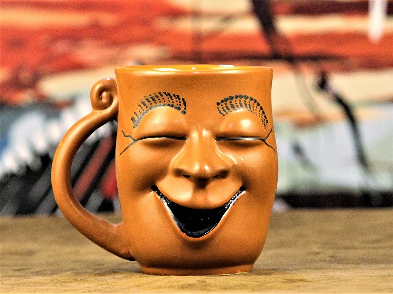 A smiling brown mug