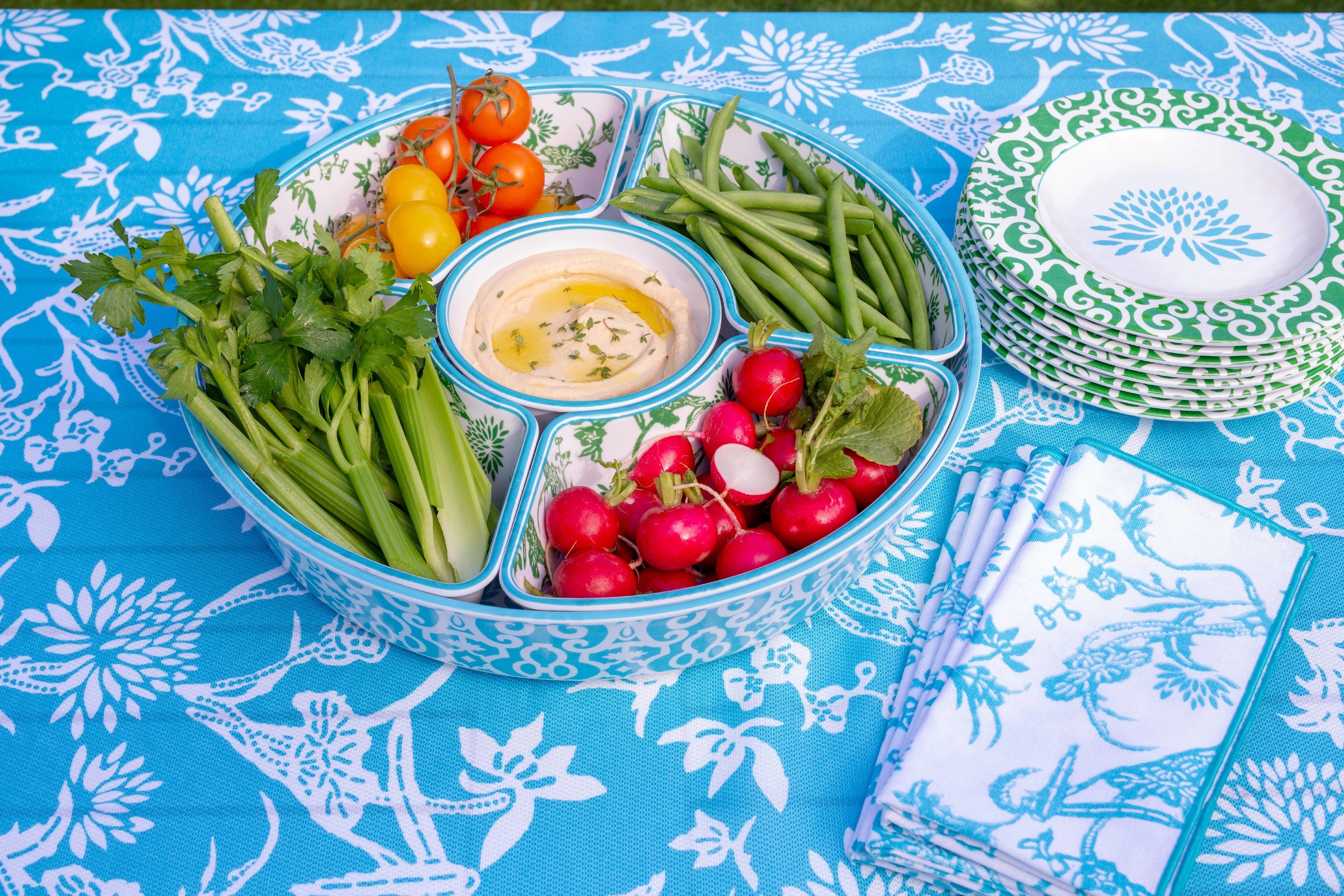 The blue patterned bowl on a blue patterned tablecloth