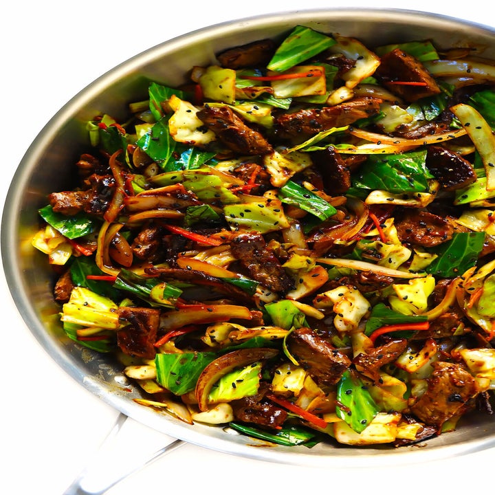 A big skillet of stir-fried cabbage and beef in garlic sesame sauce.