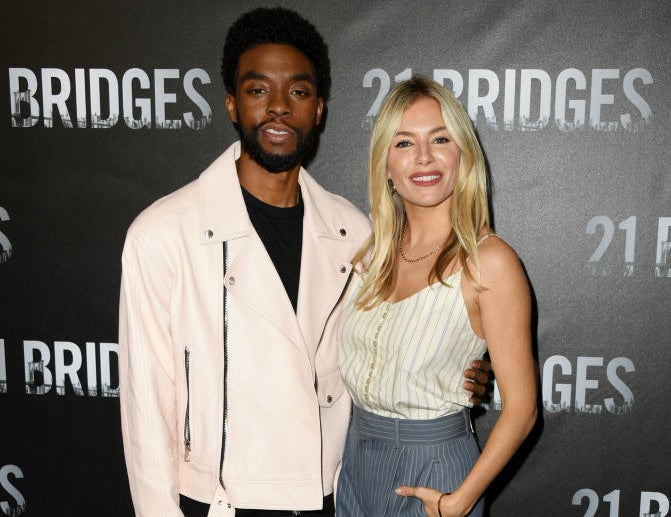 Chadwick Boseman and Sienna Miller attend the photo call for &quot;21 Bridges&quot;