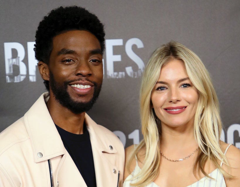 Chadwick Boseman and Sienna Miller attend a photo call for &quot;21 Bridges&quot;