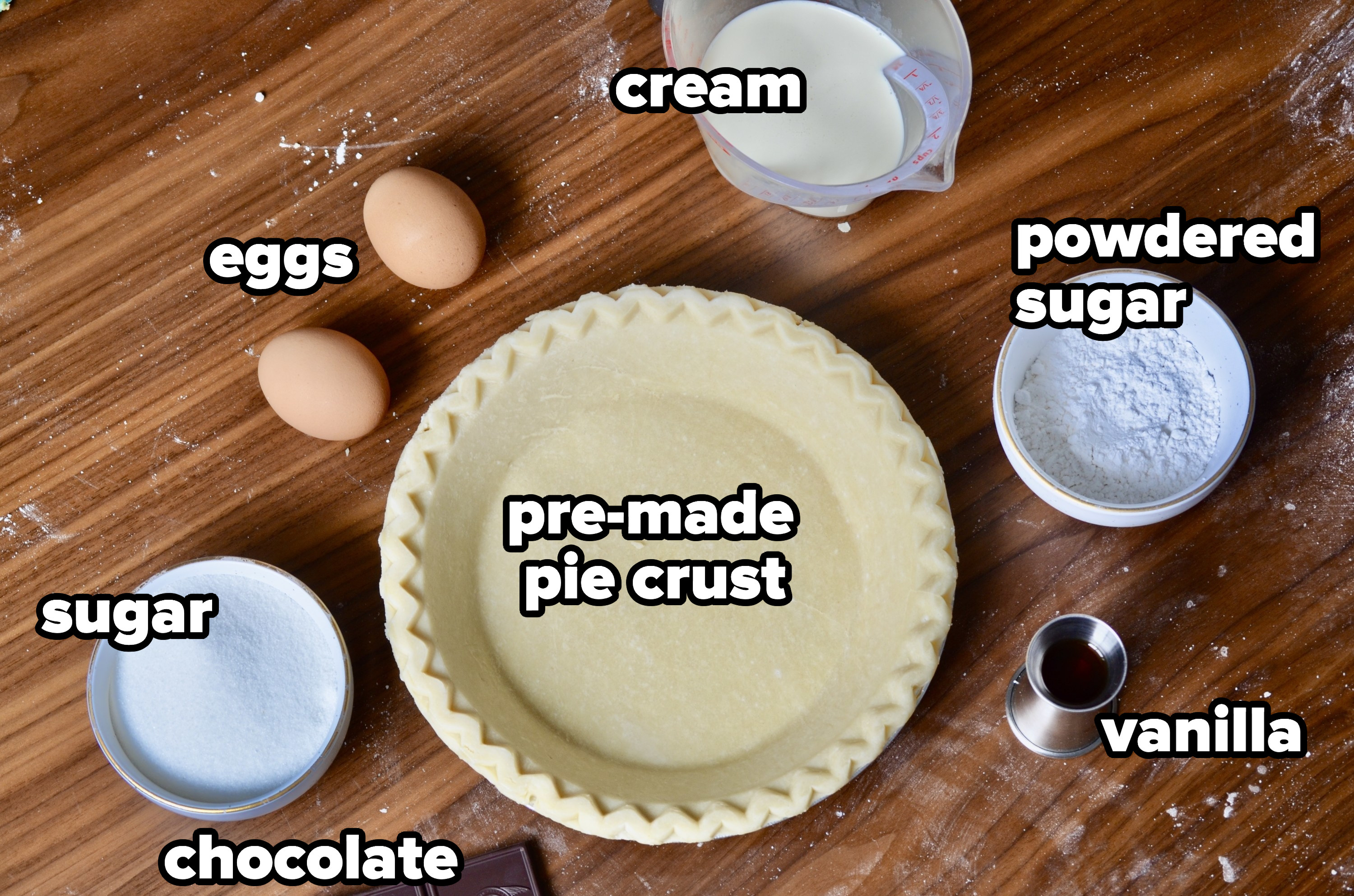 A storebought pie crust, sugar, powdered sugar, eggs, chocolate, vanilla, and heavy cream