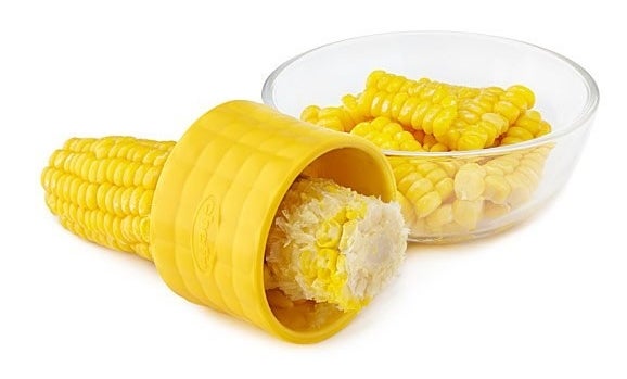 A kernel-themed corn stripper shaped like a ring to fit over the corn