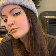 A reviewer with winged liner after using the stamp