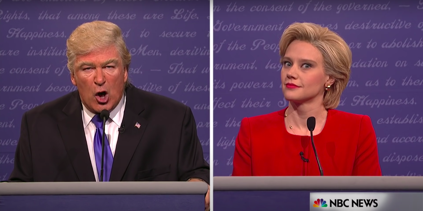 Kate McKinnon impersonates Hillary Clinton looking at the camera during the first 2016 Presidential debate