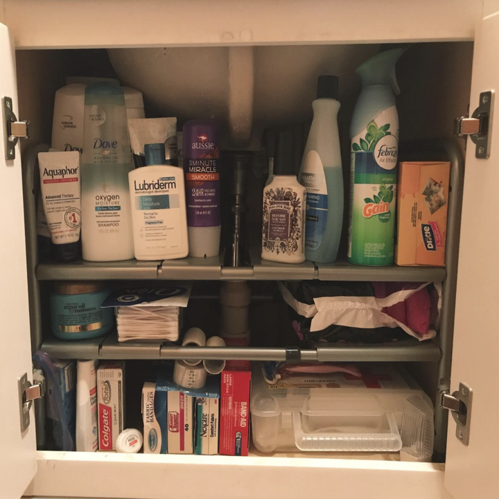 The product used to organize under-the-sink space (two shelves)