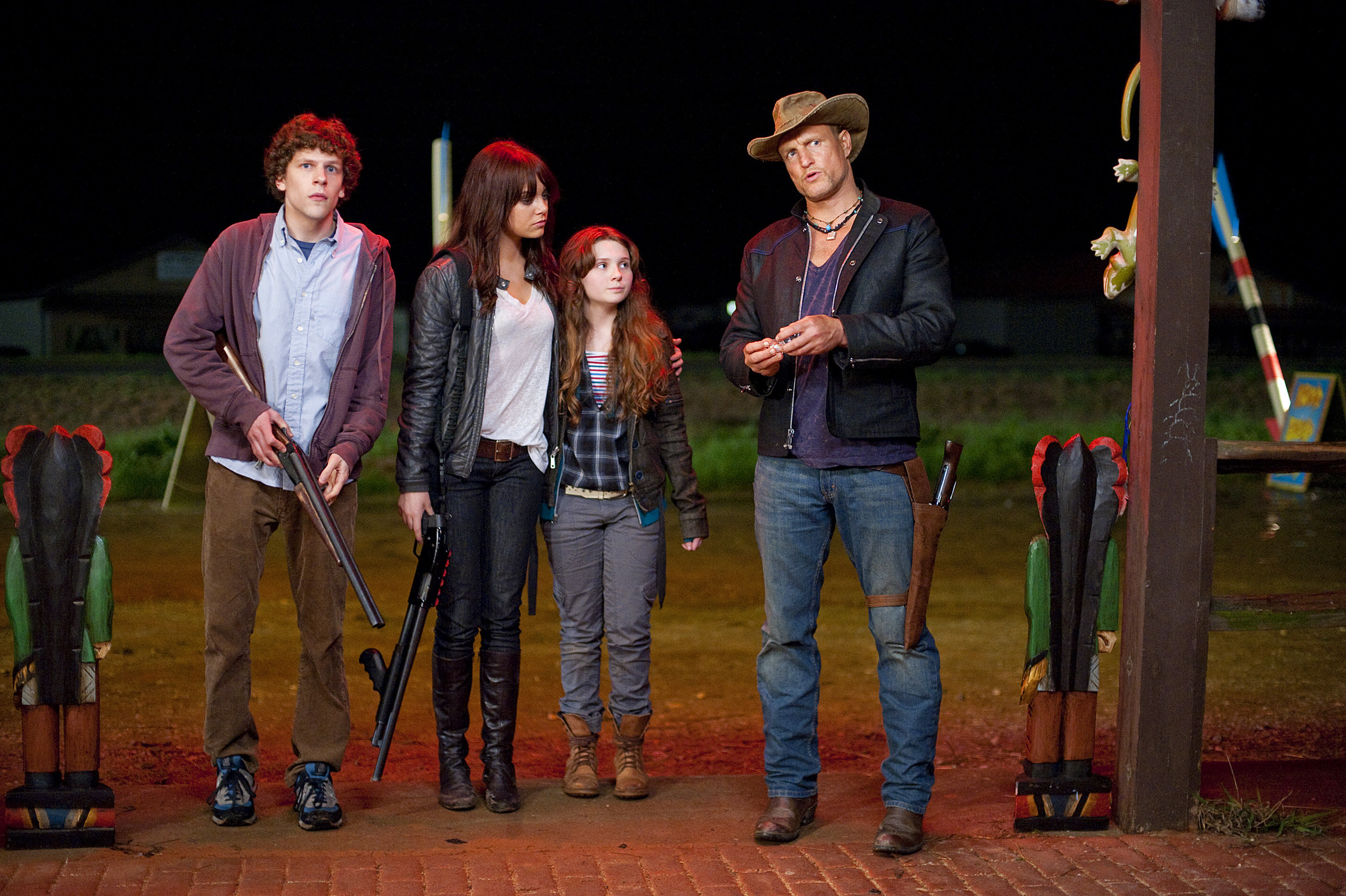 group of people preparing for zombieland outside while communicating with each other