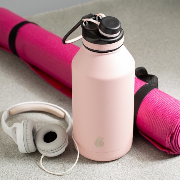 The pink water bottle and yoga gear