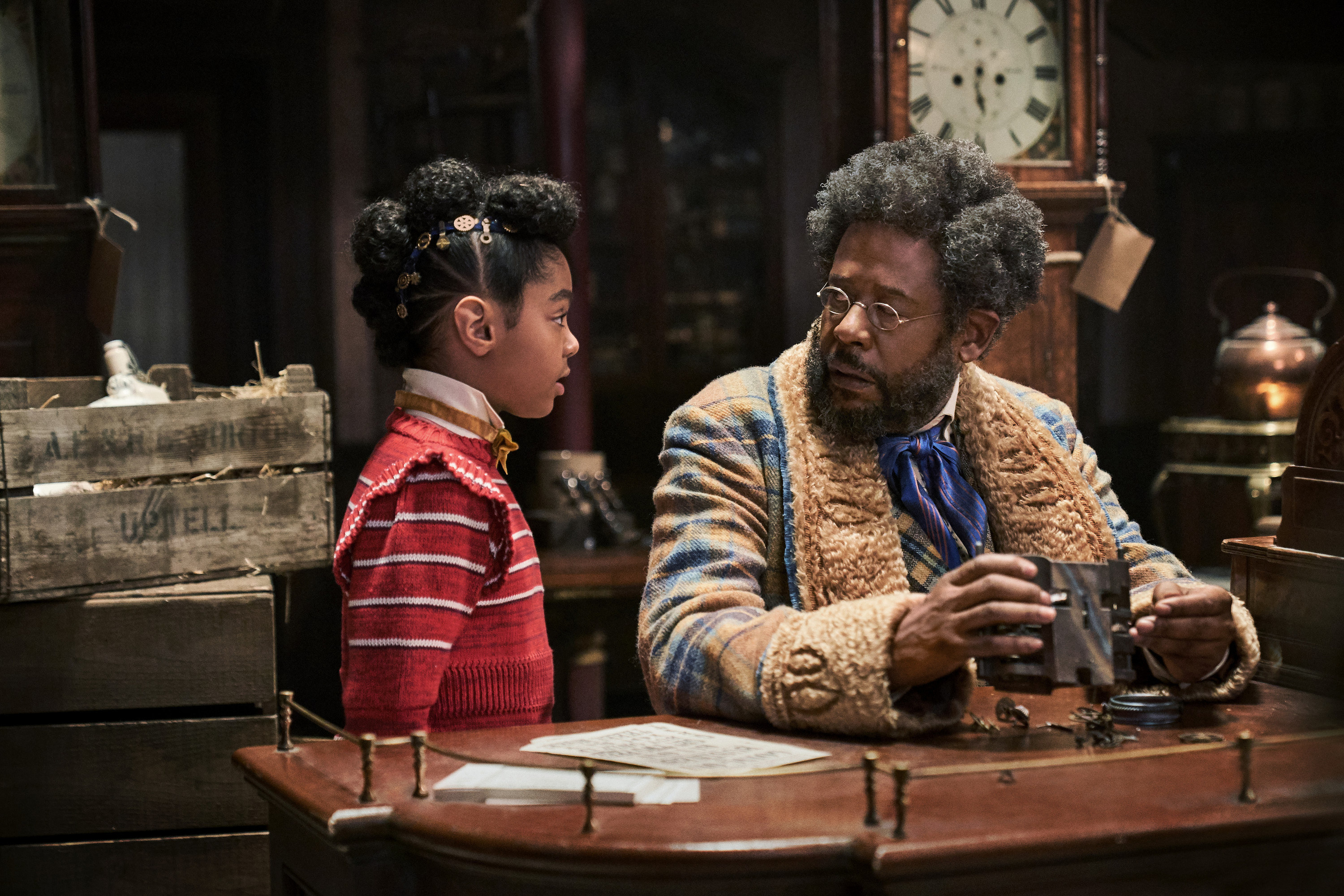 Forest Whitaker dressed in costume talking to a young girl