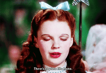 Judy Garland in the movie &quot;The Wizard of Oz&quot; saying &quot;There&#x27;s no place like home&quot; with her eyes closed. 
