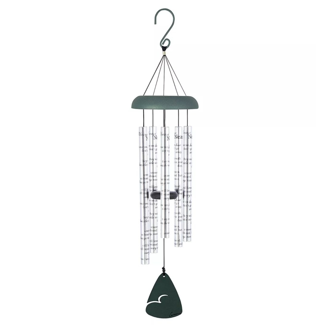 A wind chime with decorative hanging pieces