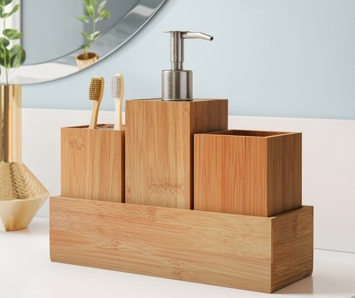 The wooden finish organizer featuring the soap dispenser and two toothbrushes being stored in the toothbrush holder area