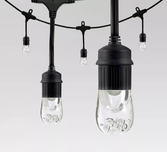 String lights with clear bulbs and black hardware