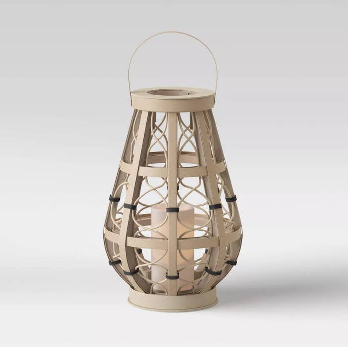 Stylish outdoor lantern with candle