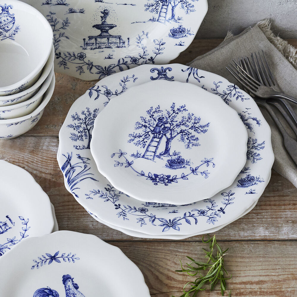 The white plates with blue illustrations