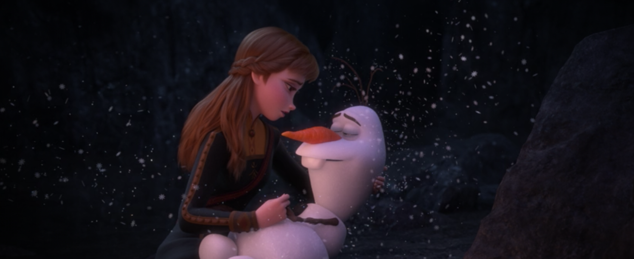 Anna holds Olaf 