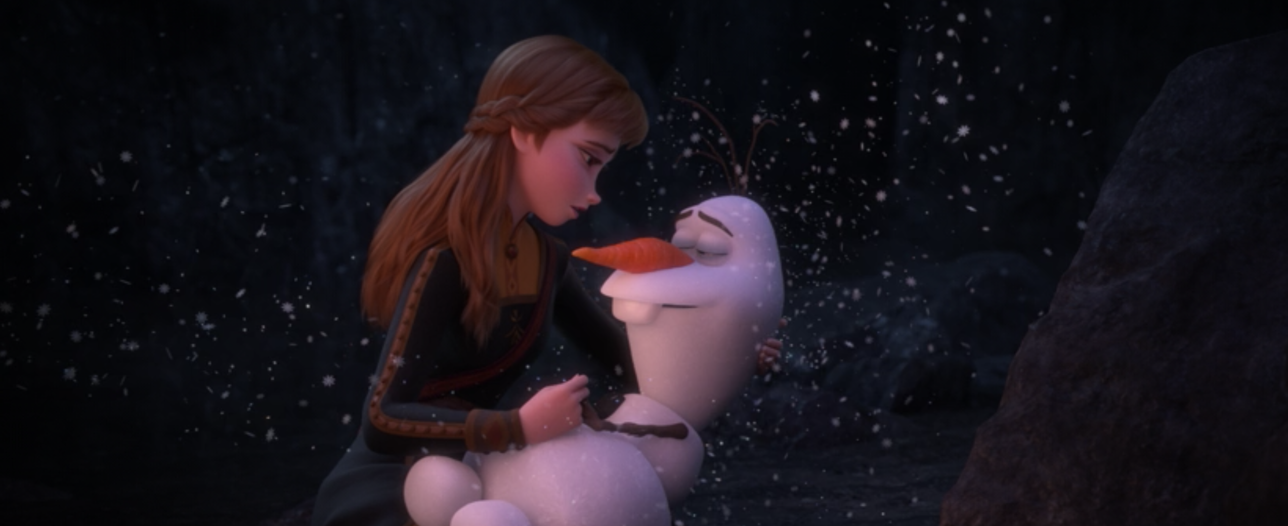 Anna holds Olaf