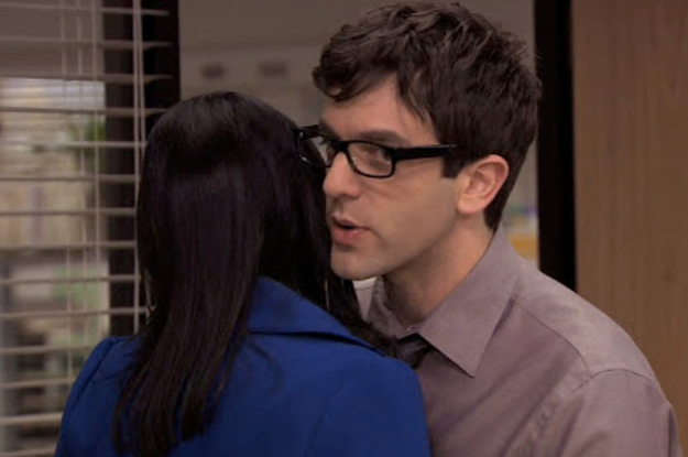 Ryan from The Office whispering into Kelly's ear 