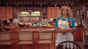 A gif of Beverly from &quot;The Goldbergs&quot; dropping a dish