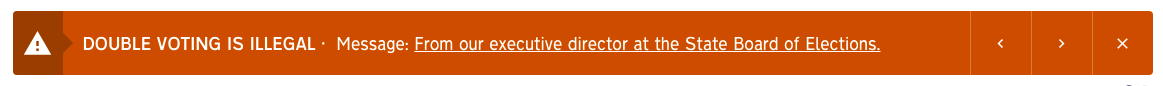 A website alert reading &quot;DOUBLE VOTING IS ILLEGAL&quot; and linking to a message from the North Carolina State Board of Elections executive director.