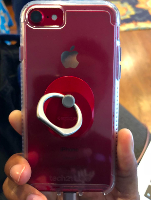 Reviewer&#x27;s red and silver phone ring on back of case