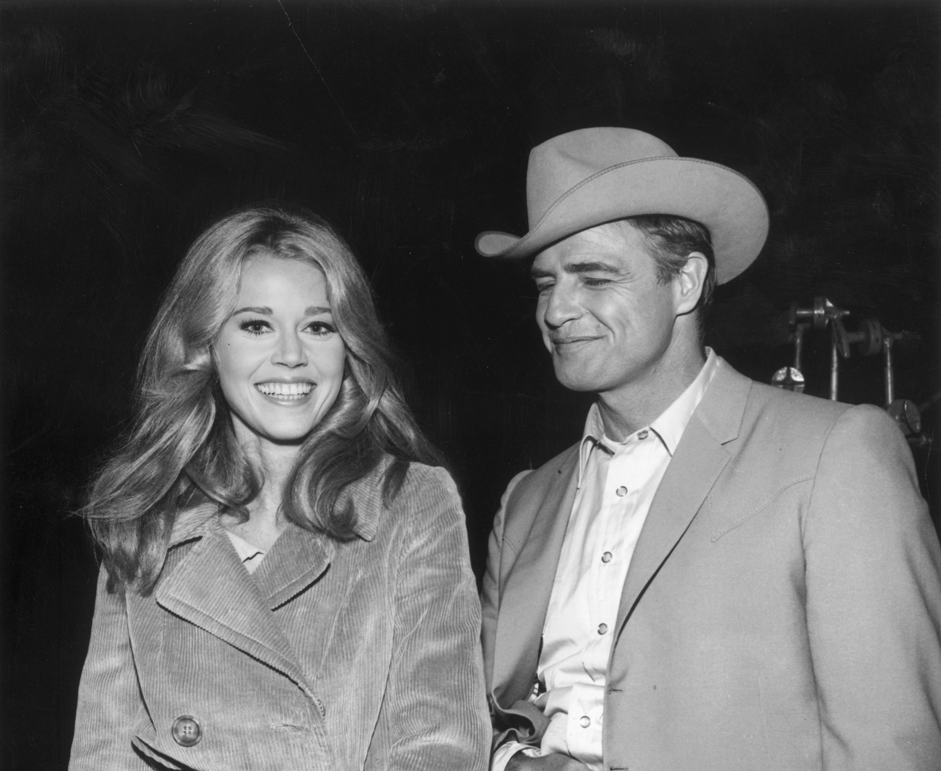 A black and white photo of Jane Fonda and Marlon Brando on set of &quot;The Chase&quot; in 1966
