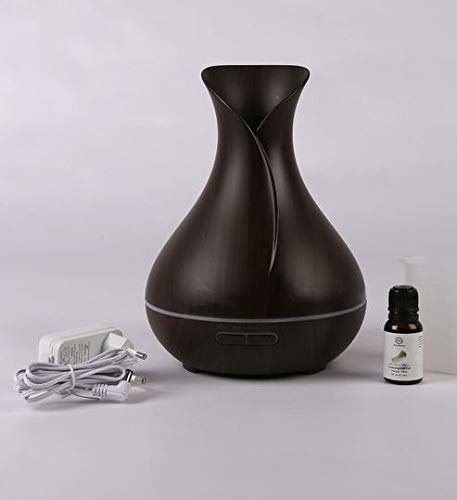 A black wood-grain diffuser shaped like a pitcher.