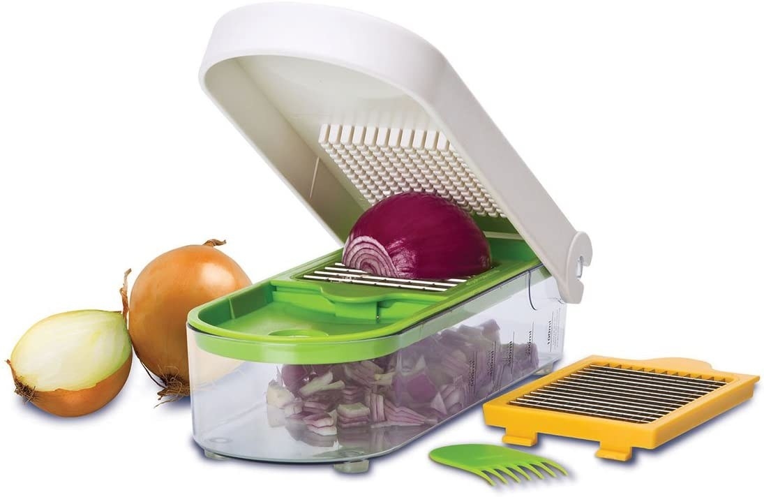 An onion on a vegetable shopper about to be diced