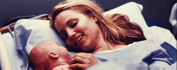 Quinn with her baby at the hospital right after delivering 