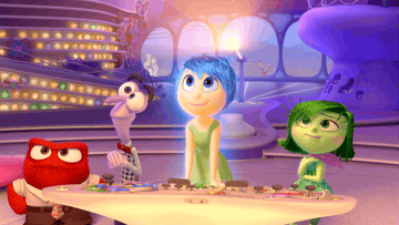 a gif of the characters from inside out watching a screen