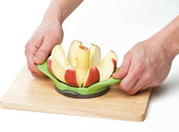 Model demonstrating how to use the slicer to cut apples