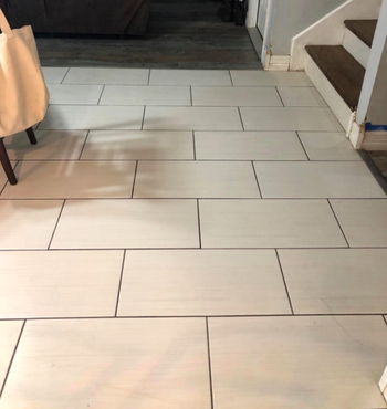 The same reviewer's tile floor now looking completely clean