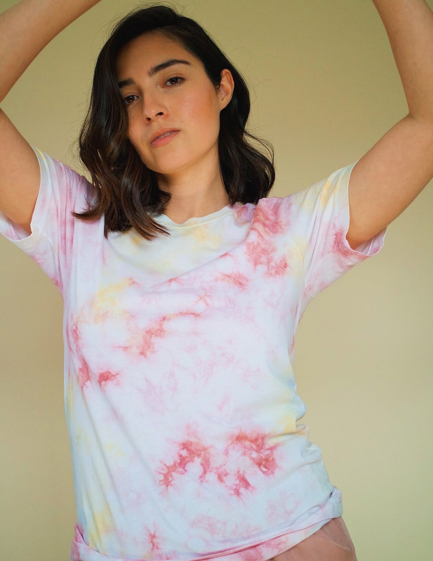 A model wearing the Playa organic cotton T-shirt.