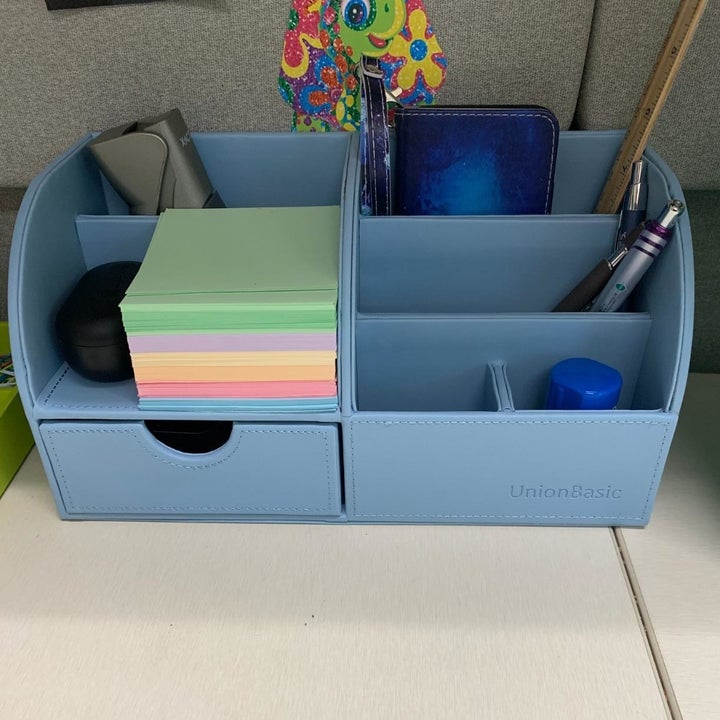 The blue UnionBasic Office Desk Organizer on a customer's desk