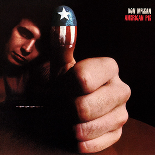 album cover of American Pie with Don McClean giving a thumbs up, while his thumb has the American flag with one star painted on it