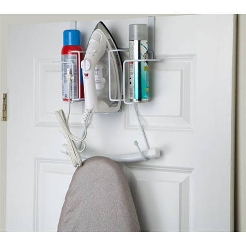 The over the door hanger being used to hang an ironing board and iron