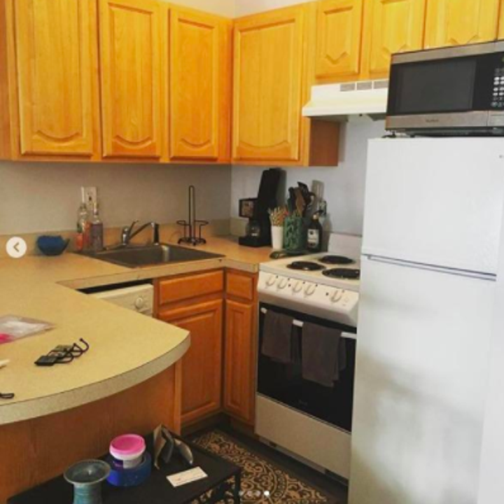 reviewer's pic of outdated looking kitchen