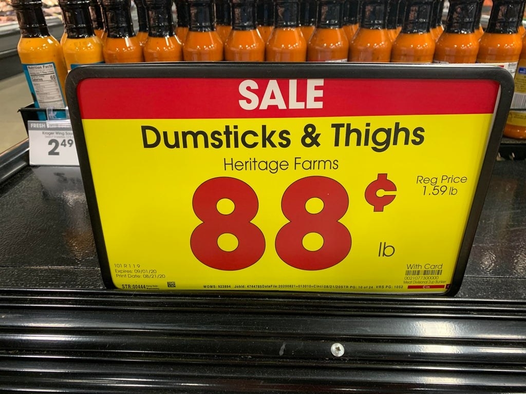 Sign reading &quot;dumsticks &amp;amp; thighs&quot;