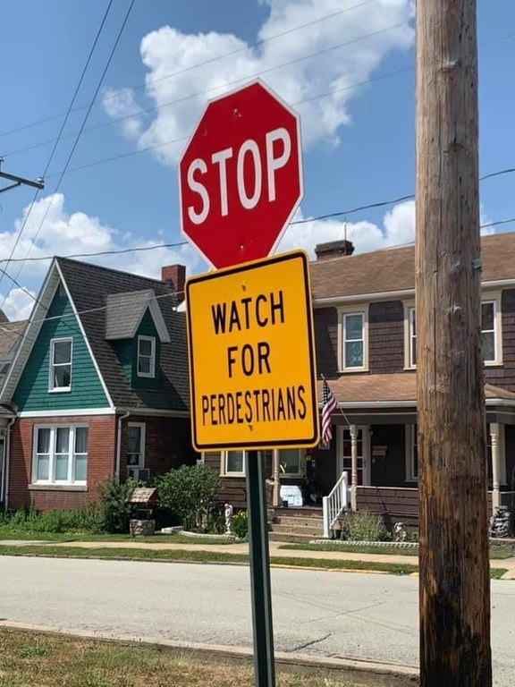 Sign reading &quot;watch for perdestrians&quot;