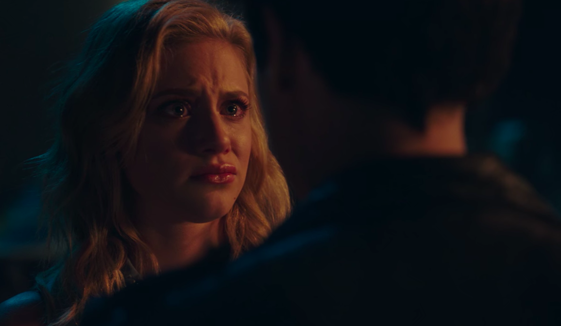 Betty cries as Jughead tells her they need to stay apart