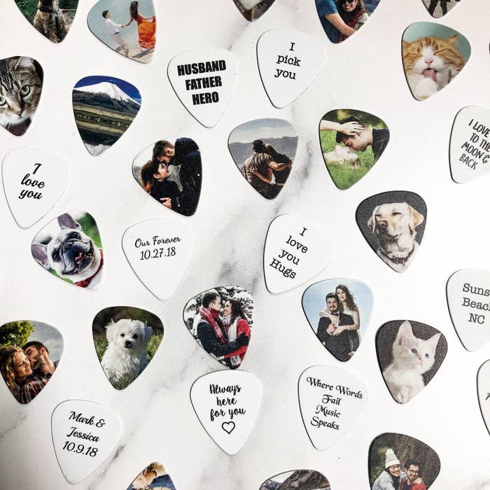 A variety of custom picks featuring a photos of pets and loved ones on one side and messages like &quot;I love you&quot; and &quot;Always here for you&quot; on the other side