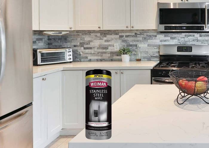 Bottle of stainless steel wipes on a kitchen counter