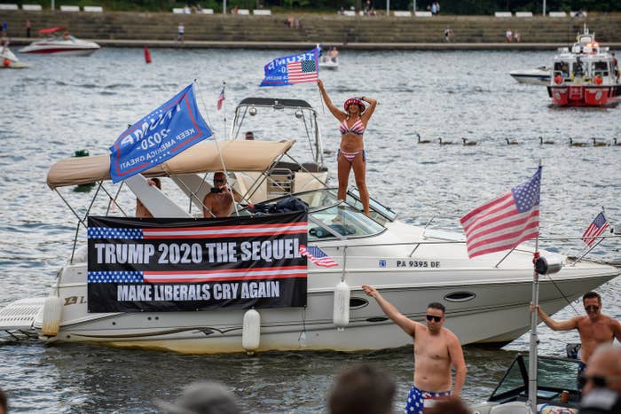 A boat with a sign saying &quot;Trump 2020 The Sequel, Make Liberals Cry Again&quot;