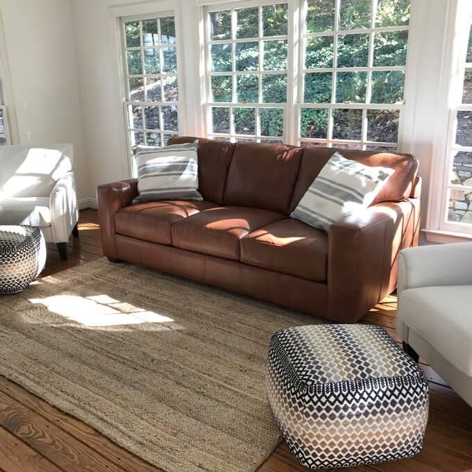 The brown genuine leather sofa