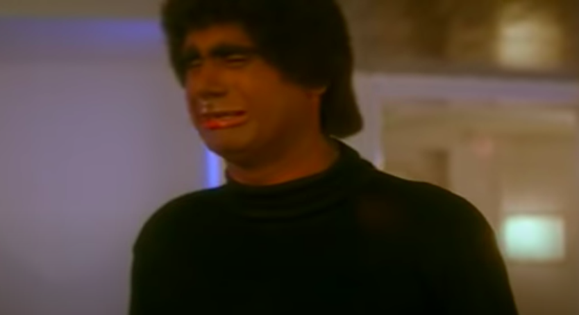 a man wearing blackface cries in a scene from the movie hadh kardi aapne