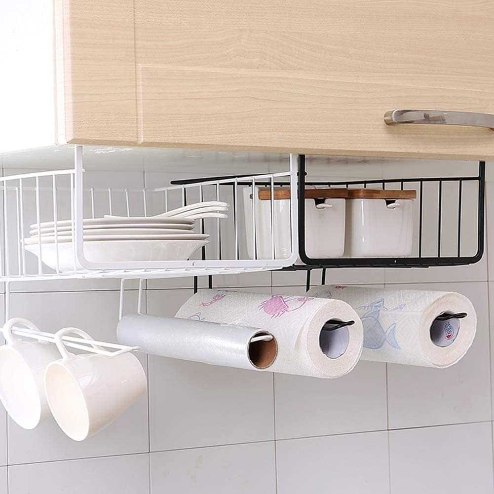 two under-shelf baskets filled with dishware