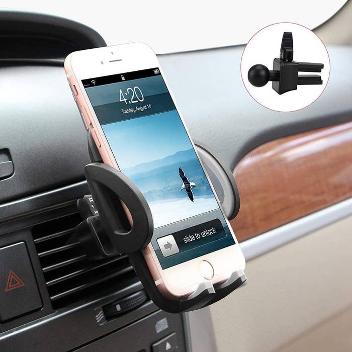 An iPhone  secured in the phone mount